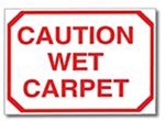 Caution Wet Carpet Sign